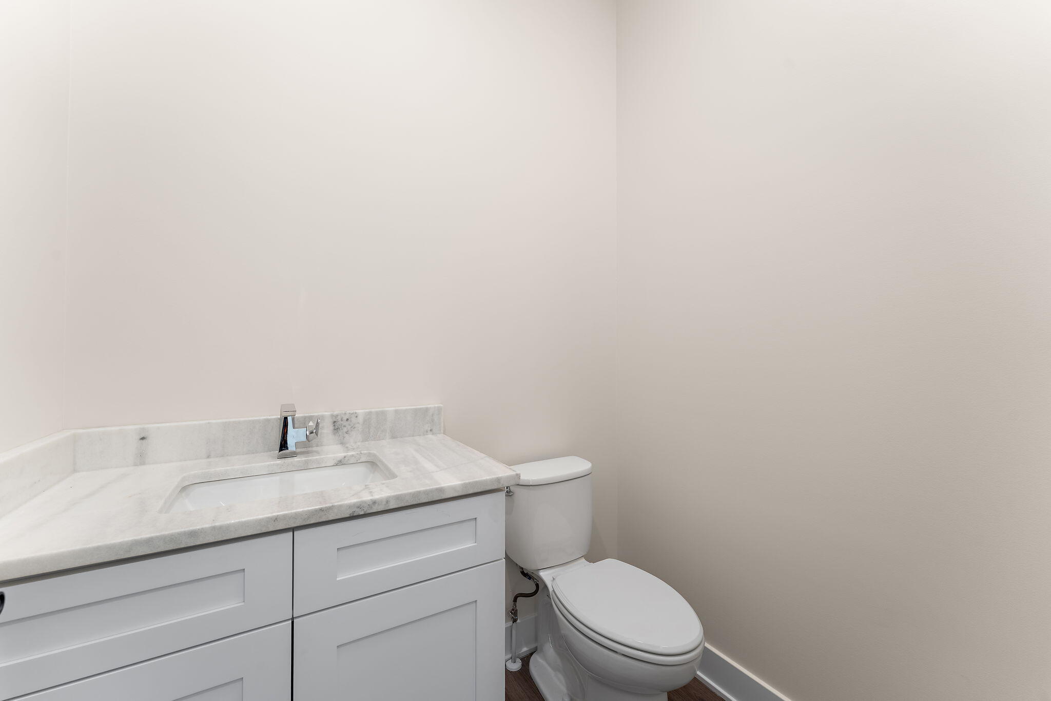 16669 Noble Street Lowell, IN 46356 - Photo 32 of 55 a bathroom with a granite countertop toilet and sink