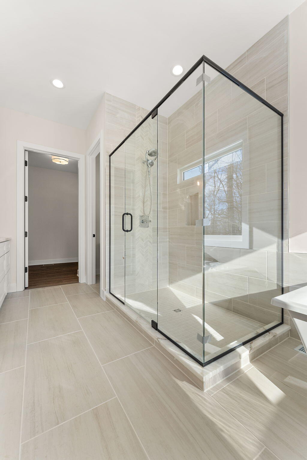 16669 Noble Street Lowell, IN 46356 - Photo 38 of 55 a bathroom with a glass door shower