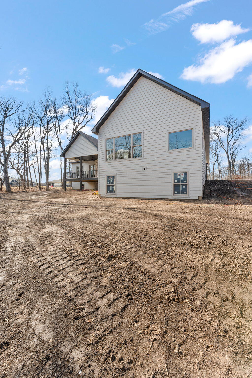 16669 Noble Street Lowell, IN 46356 - Photo 55 of 55 a front view of a house with a yard