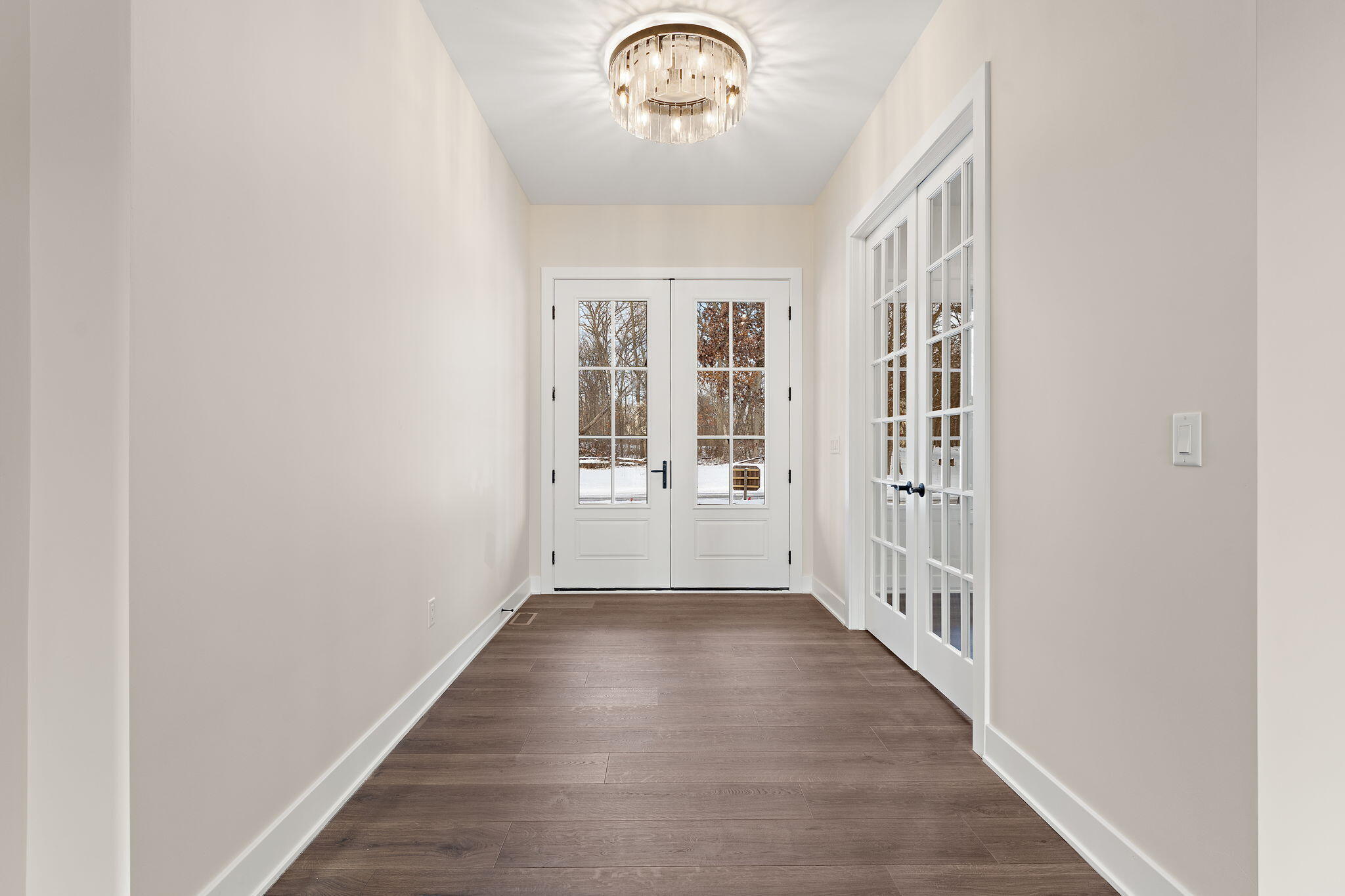 16669 Noble Street Lowell, IN 46356 - Photo 10 of 55 a view of a hallway with wooden floor