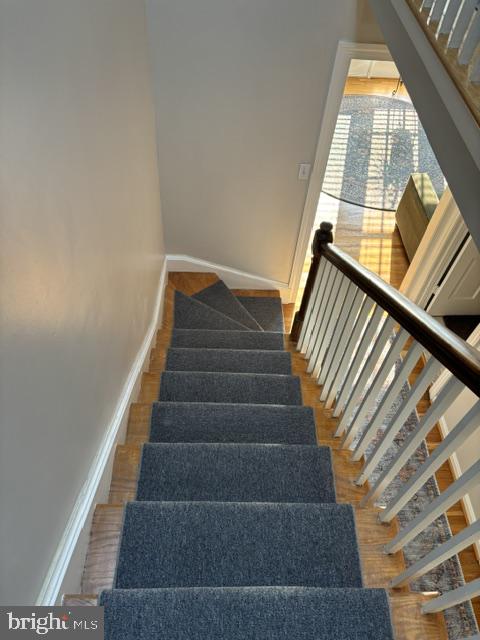 608 6th Place Southwest Washington, DC 20024 - Photo 56 of 65 Inviting staircase with cozy charm.
