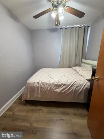 a bathroom with a sink toilet and a shower
