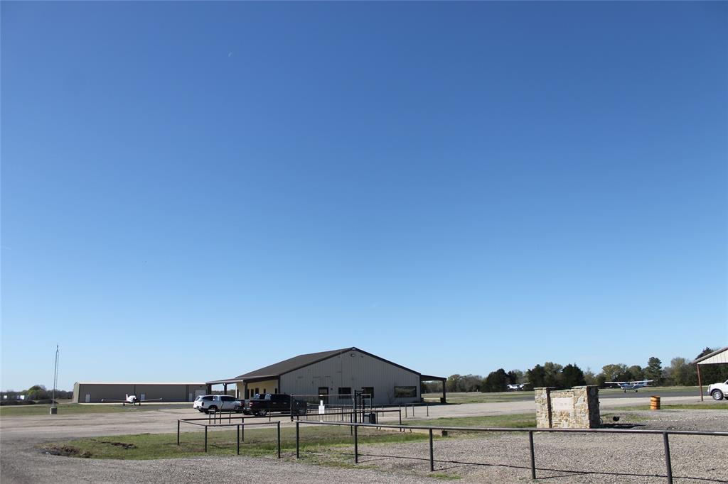 37444 State Highway 64 Wills Point, TX 75169 - Photo 6 of 6 a front view of a house with a yard