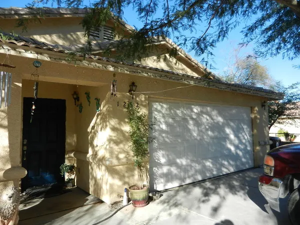 a view of backyard of a house