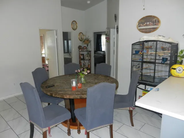 a view of a dining room with furniture