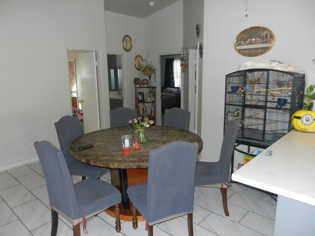 1252 Roselle Avenue Thermal, CA 92274 - Photo 8 of 32 a view of a dining room with furniture