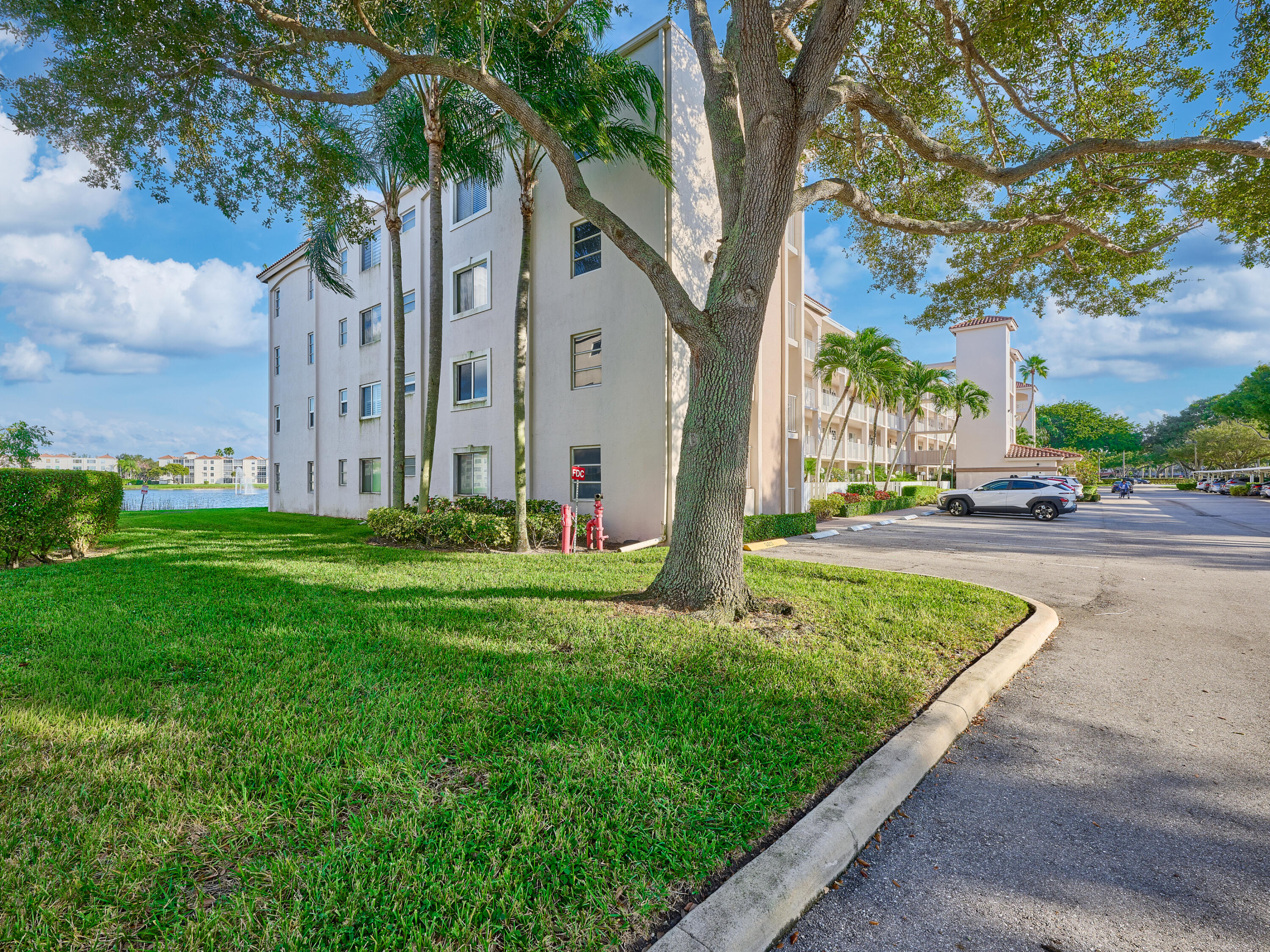14112 Huntington Pointe Drive, Unit 401 Delray Beach, FL 33484 - Photo 49 of 49 a view of a street in front of a building