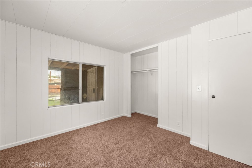 52102 Date Avenue Cabazon, CA 92230 - Photo 19 of 32 a view of an empty room with a window