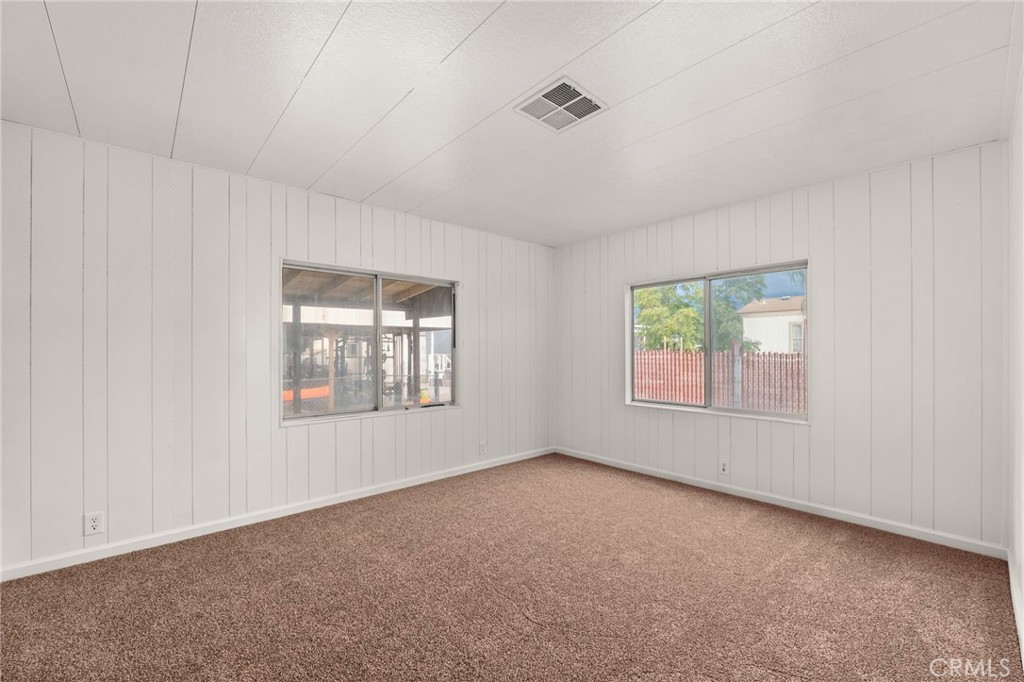 52102 Date Avenue Cabazon, CA 92230 - Photo 24 of 32 an empty room with windows