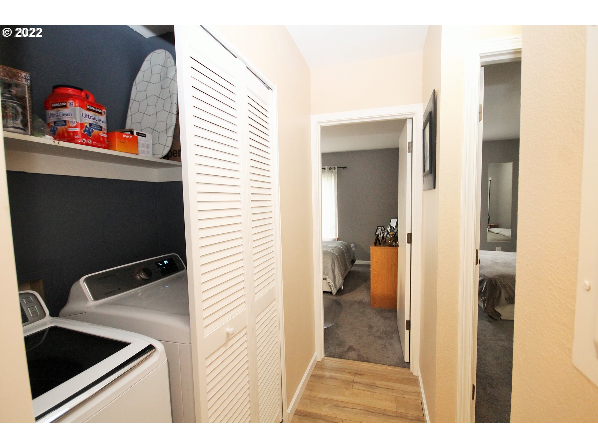 8720 Southwest Tualatin Road, Unit 107 Tualatin, OR 97062 - Photo 16 of 30 a view of a bathroom from a hallway
