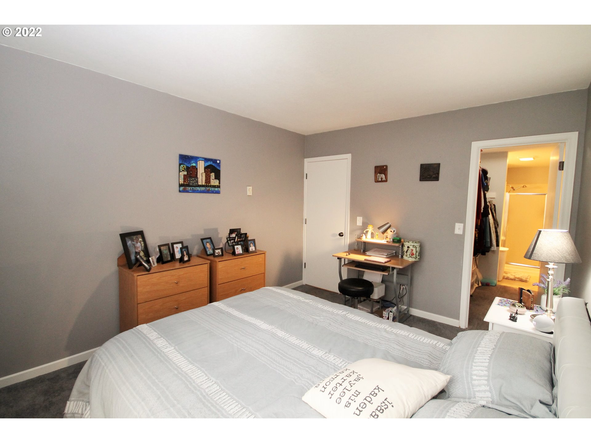 8720 Southwest Tualatin Road, Unit 107 Tualatin, OR 97062 - Photo 20 of 30 a bedroom with furniture and a bed