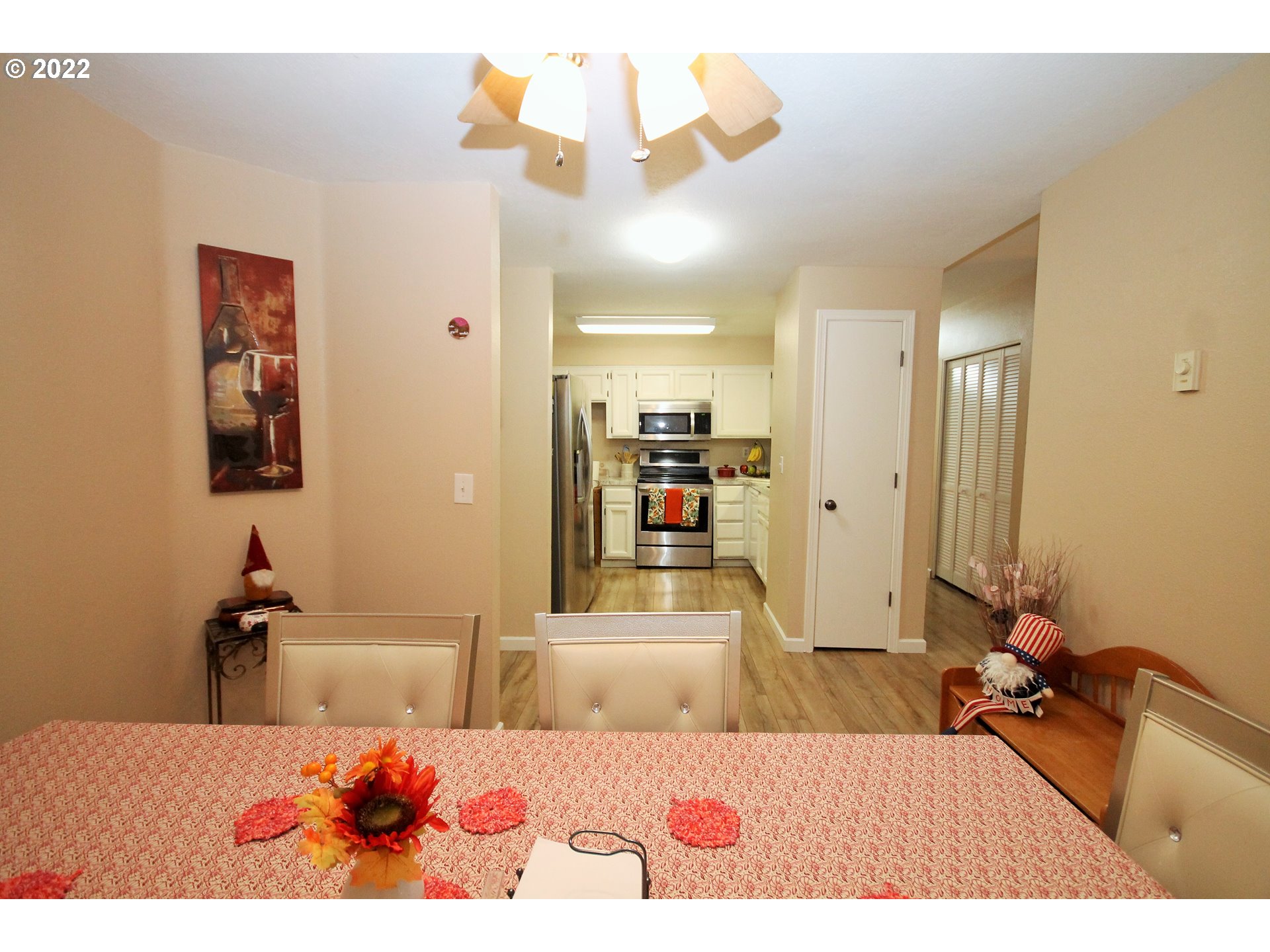 8720 Southwest Tualatin Road, Unit 107 Tualatin, OR 97062 - Photo 8 of 30 a living room with furniture and a flat screen tv