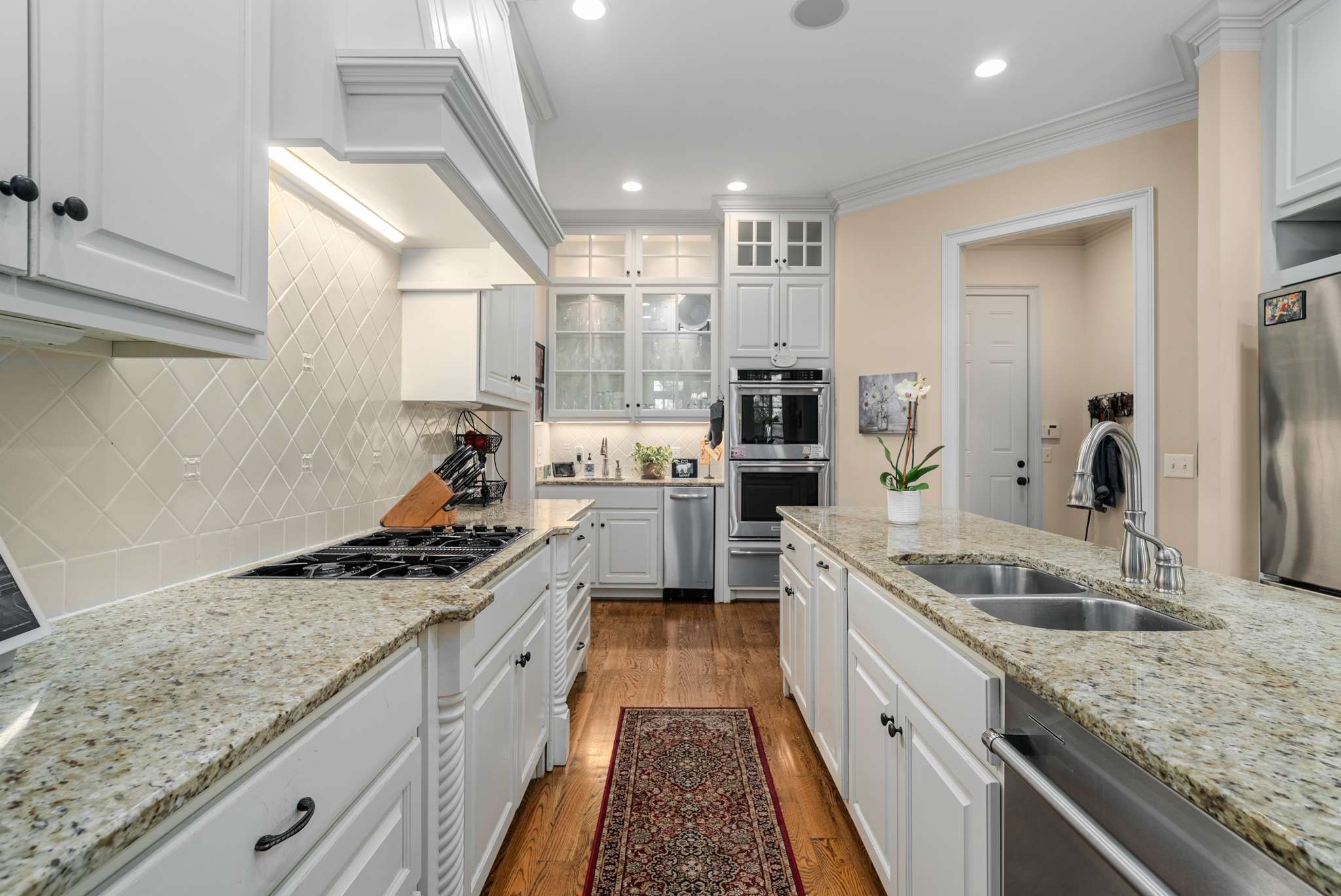 217 Page Road Nashville, TN 37205 - Photo 18 of 61 a kitchen with a sink stove and refrigerator