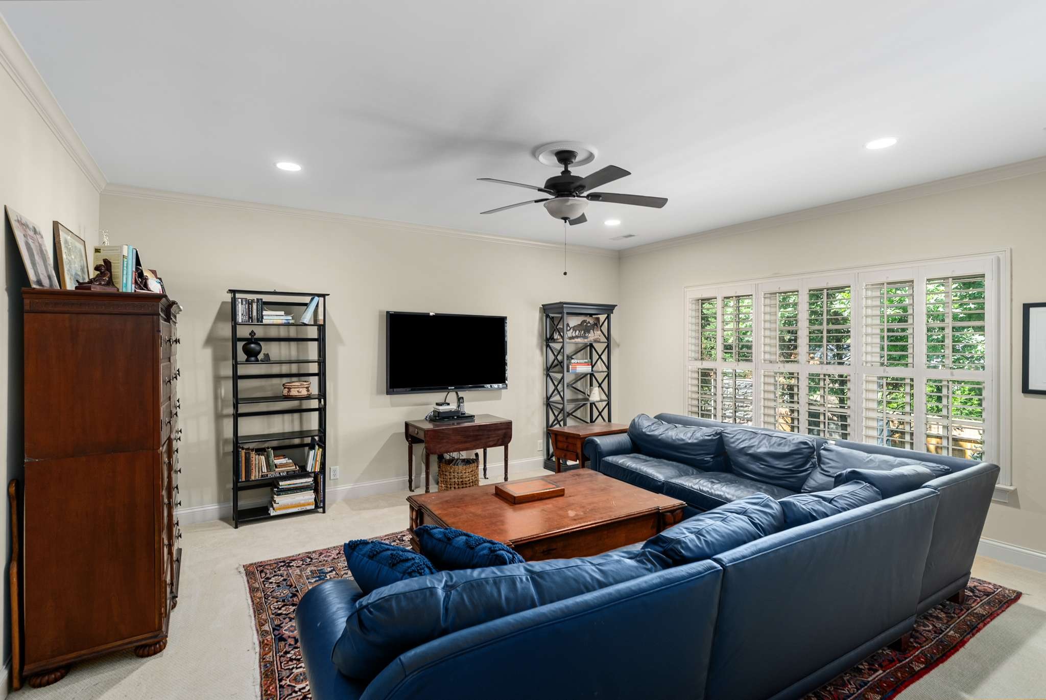 217 Page Road Nashville, TN 37205 - Photo 37 of 61 a living room with furniture and a flat screen tv