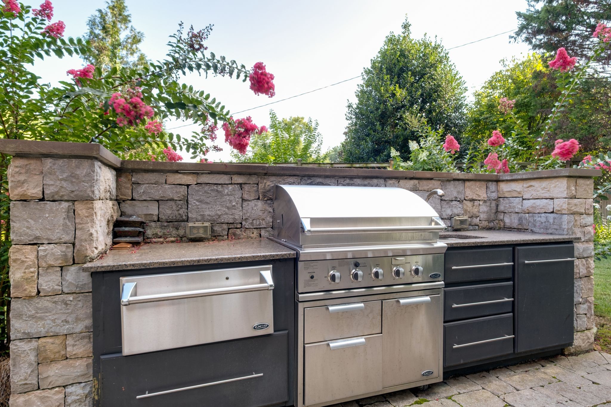 217 Page Road Nashville, TN 37205 - Photo 42 of 61 a kitchen with a stove and flowers