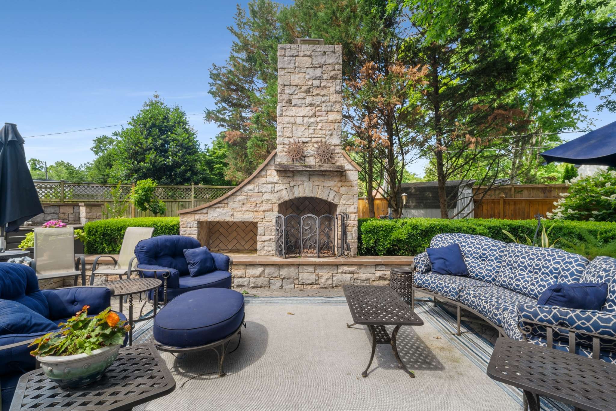 217 Page Road Nashville, TN 37205 - Photo 44 of 61 a front view of a house with garden and patio