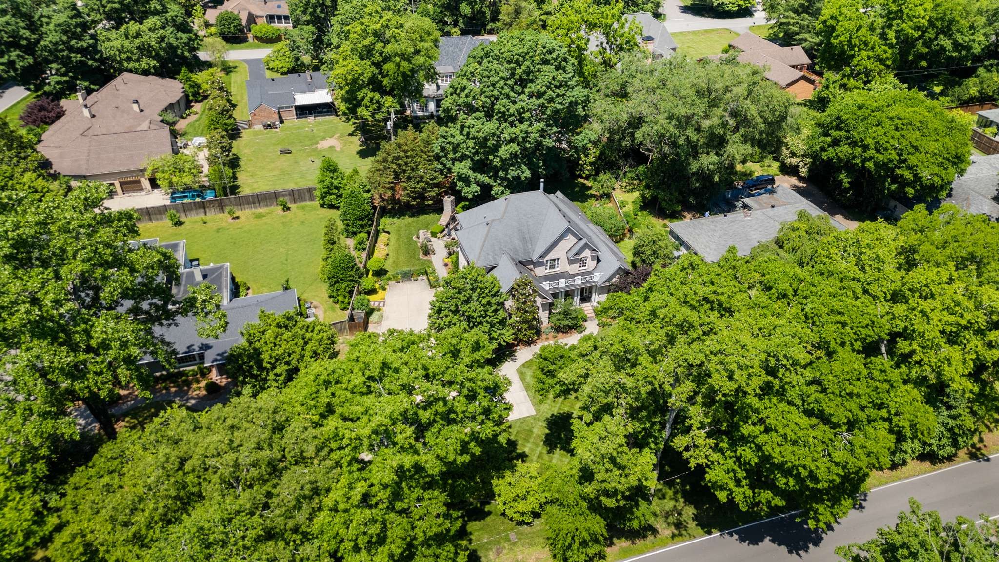 217 Page Road Nashville, TN 37205 - Photo 58 of 61 an aerial view of residential house with outdoor space and trees all around