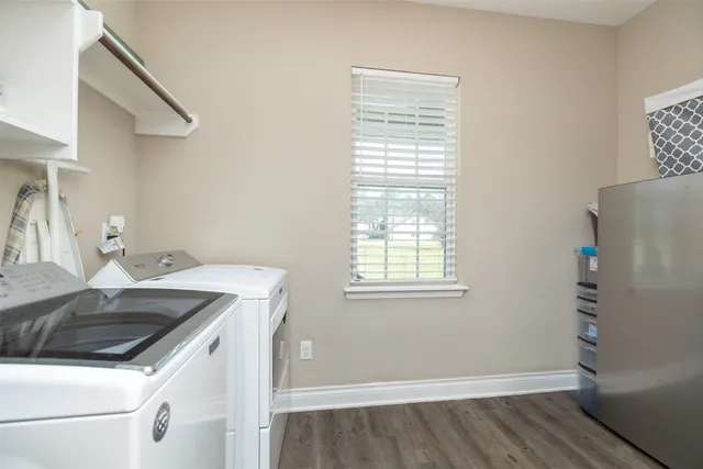 a utility room with dryer and washer