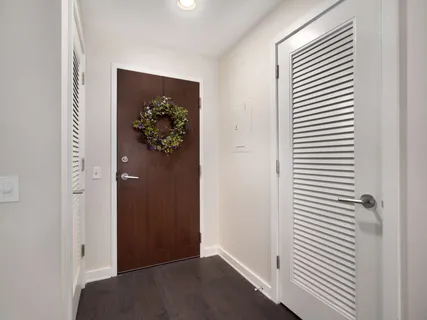 a view of a hallway with closet