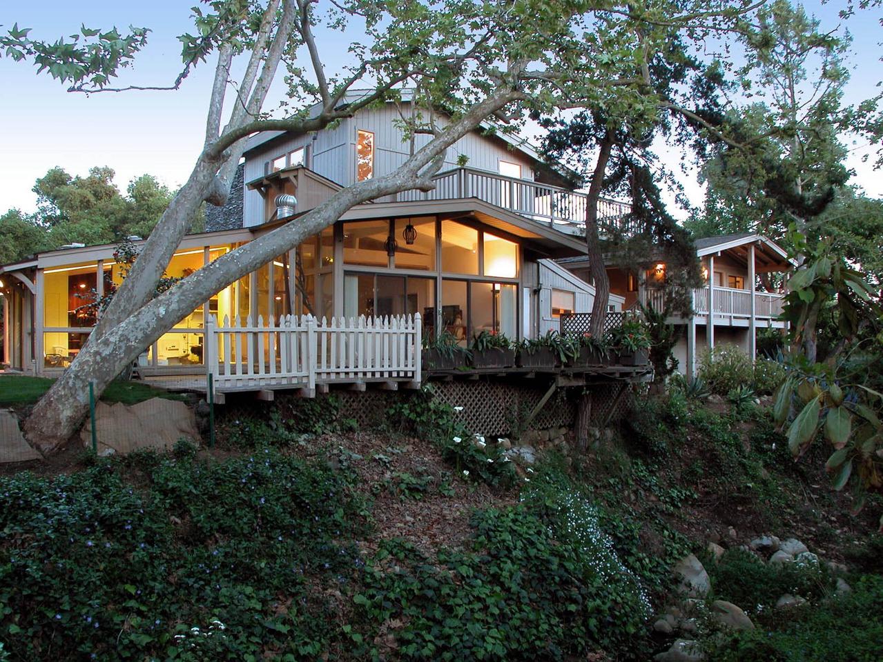 a backyard of a house with lots of green space