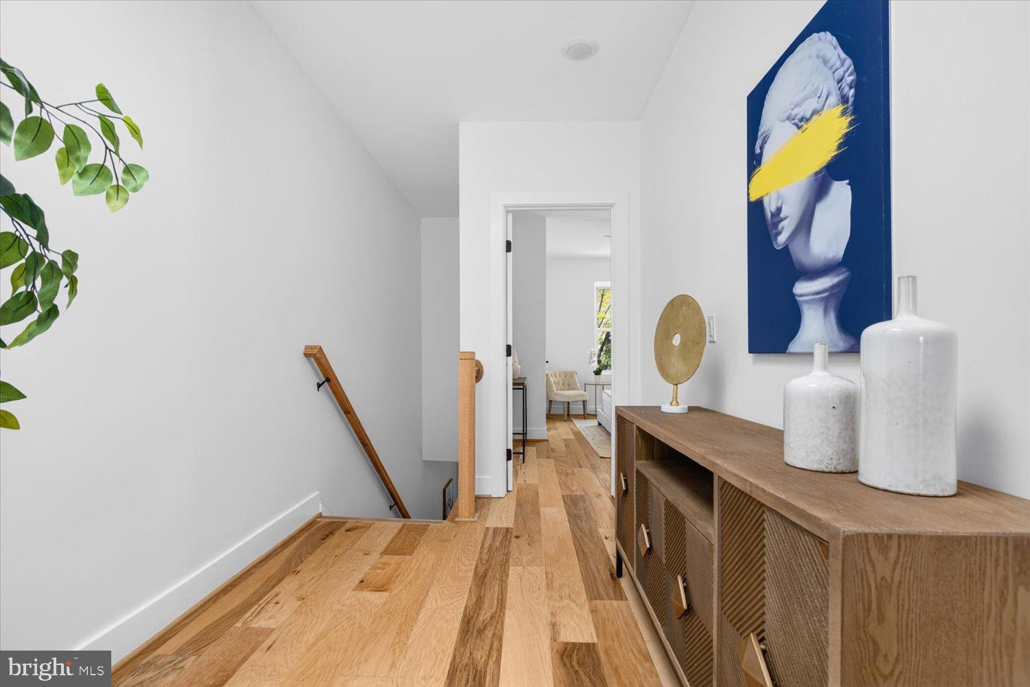 1704 Independence Avenue Southeast Washington, DC 20003 - Photo 30 of 73 Upper-level hallway w/ ample room for an armoire.