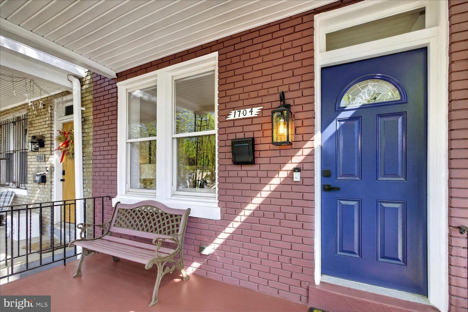 1704 Independence Avenue Southeast Washington, DC 20003 - Photo 3 of 73 Charming entry with vibrant blue door.