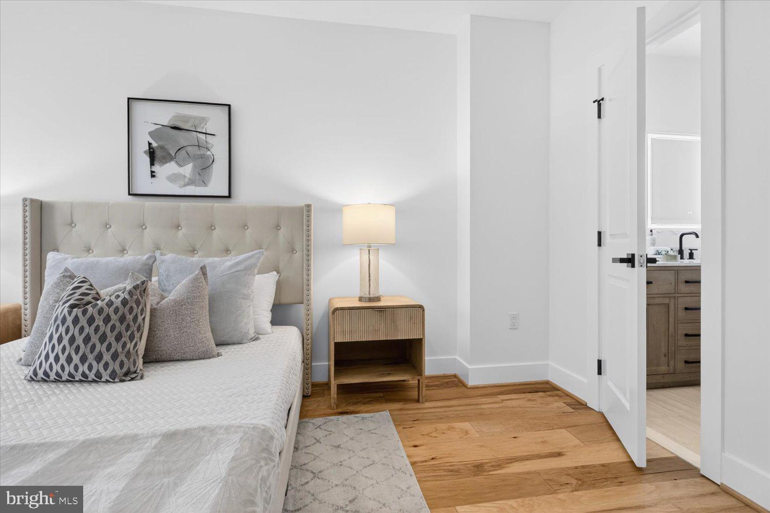1704 Independence Avenue Southeast Washington, DC 20003 - Photo 36 of 73 Serene bedroom with modern elegance.