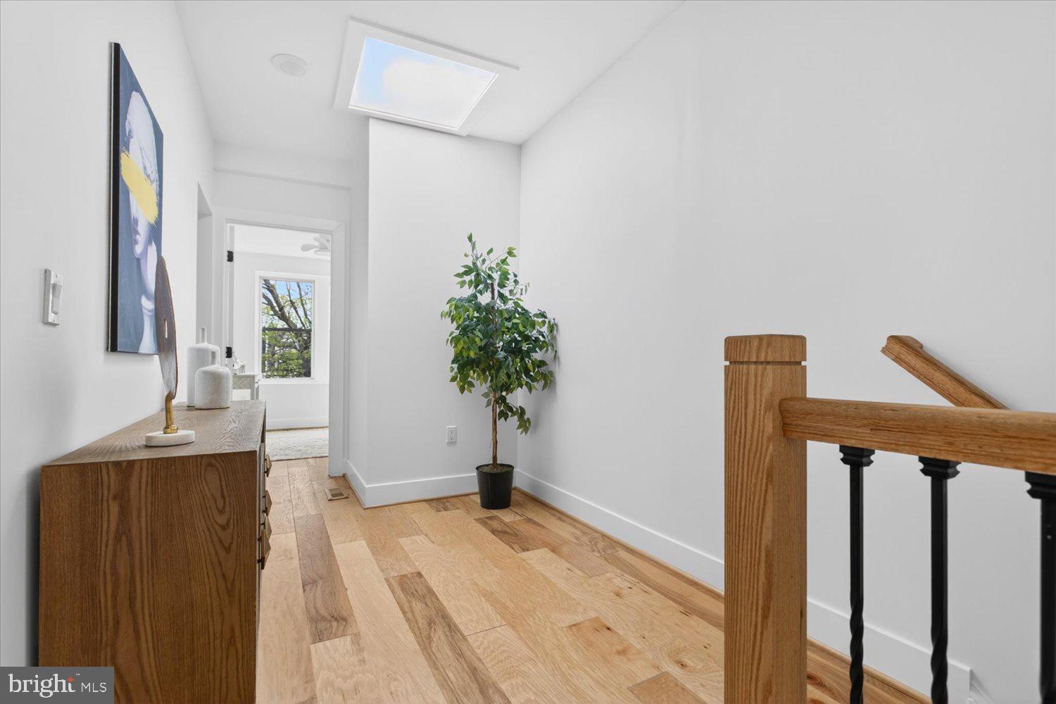 1704 Independence Avenue Southeast Washington, DC 20003 - Photo 40 of 67 a view of staircase with wooden floor and chair