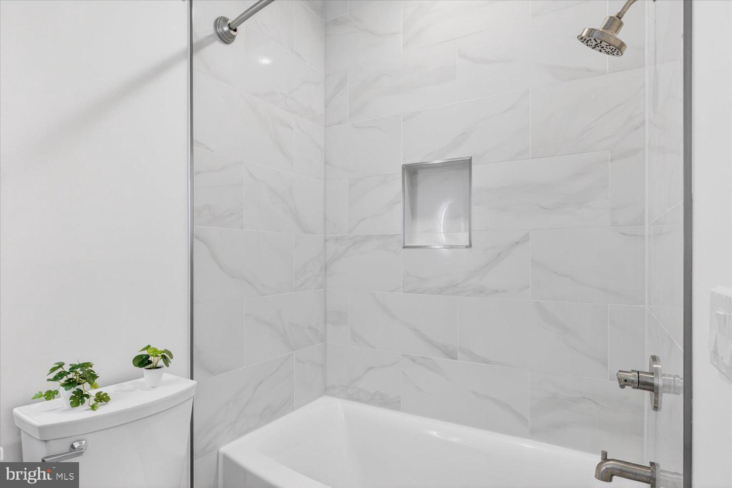 1704 Independence Avenue Southeast Washington, DC 20003 - Photo 45 of 67 a bathroom with a bathtub