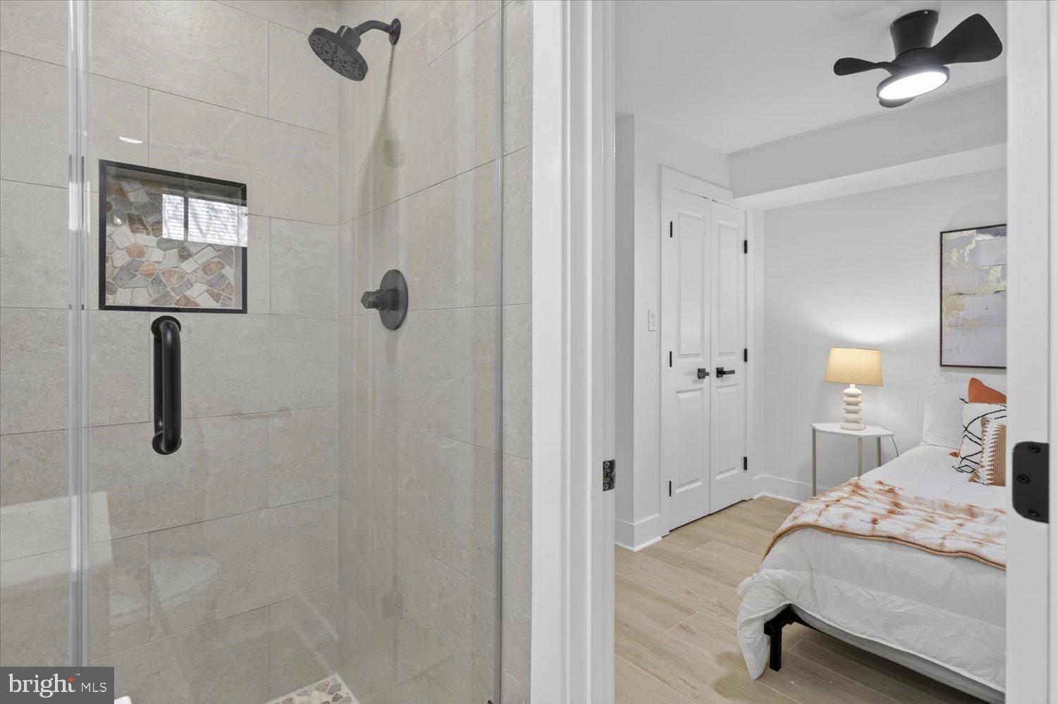 1704 Independence Avenue Southeast Washington, DC 20003 - Photo 58 of 73 Modern bathroom meets cozy bedroom.