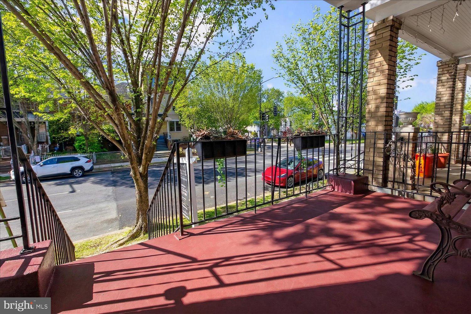 1704 Independence Avenue Southeast Washington, DC 20003 - Photo 62 of 73 Charming front porch with vibrant views.
