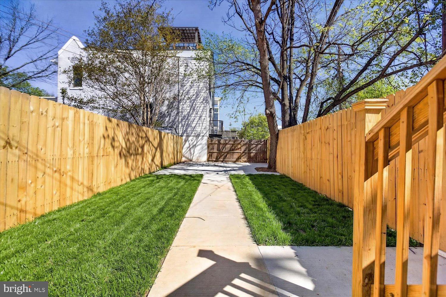 1704 Independence Avenue Southeast Washington, DC 20003 - Photo 63 of 73 Charming pathway to serene backyard.