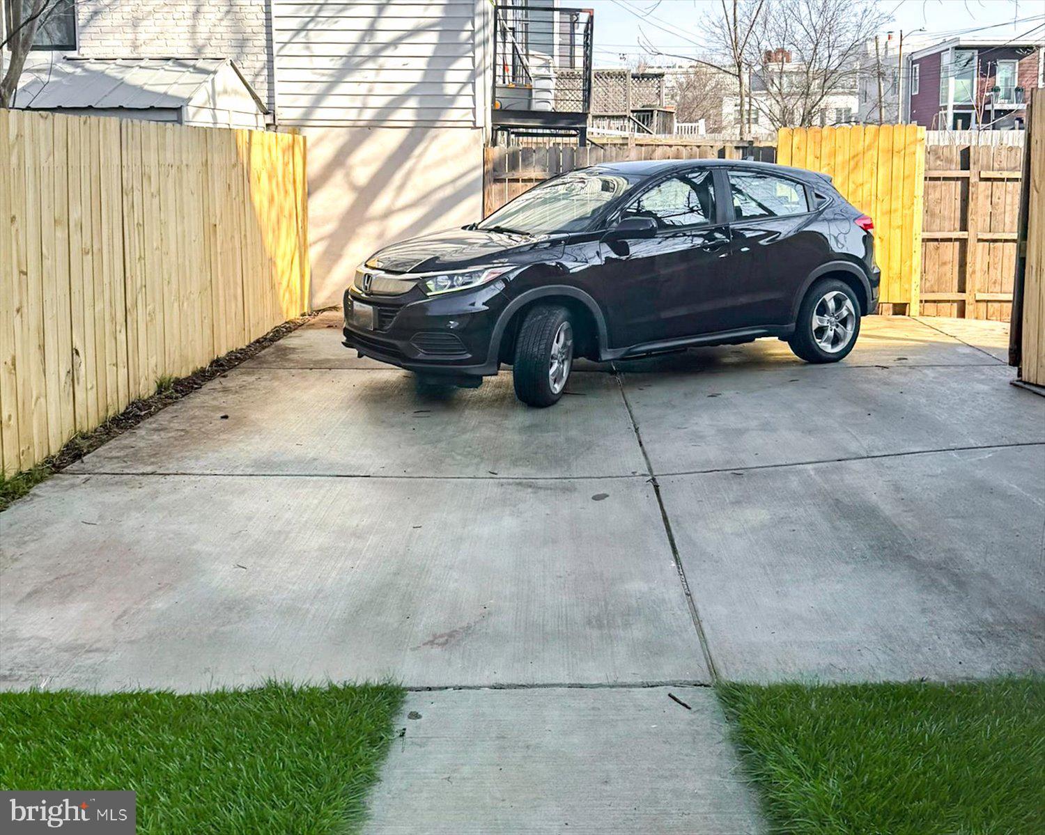 1704 Independence Avenue Southeast Washington, DC 20003 - Photo 64 of 73 Driveway with a sleek car.