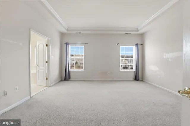 an empty room with a bathroom