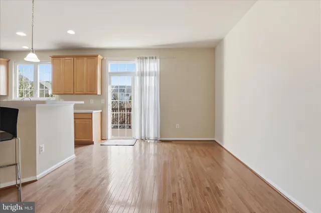 a view of balcony with wooden floor