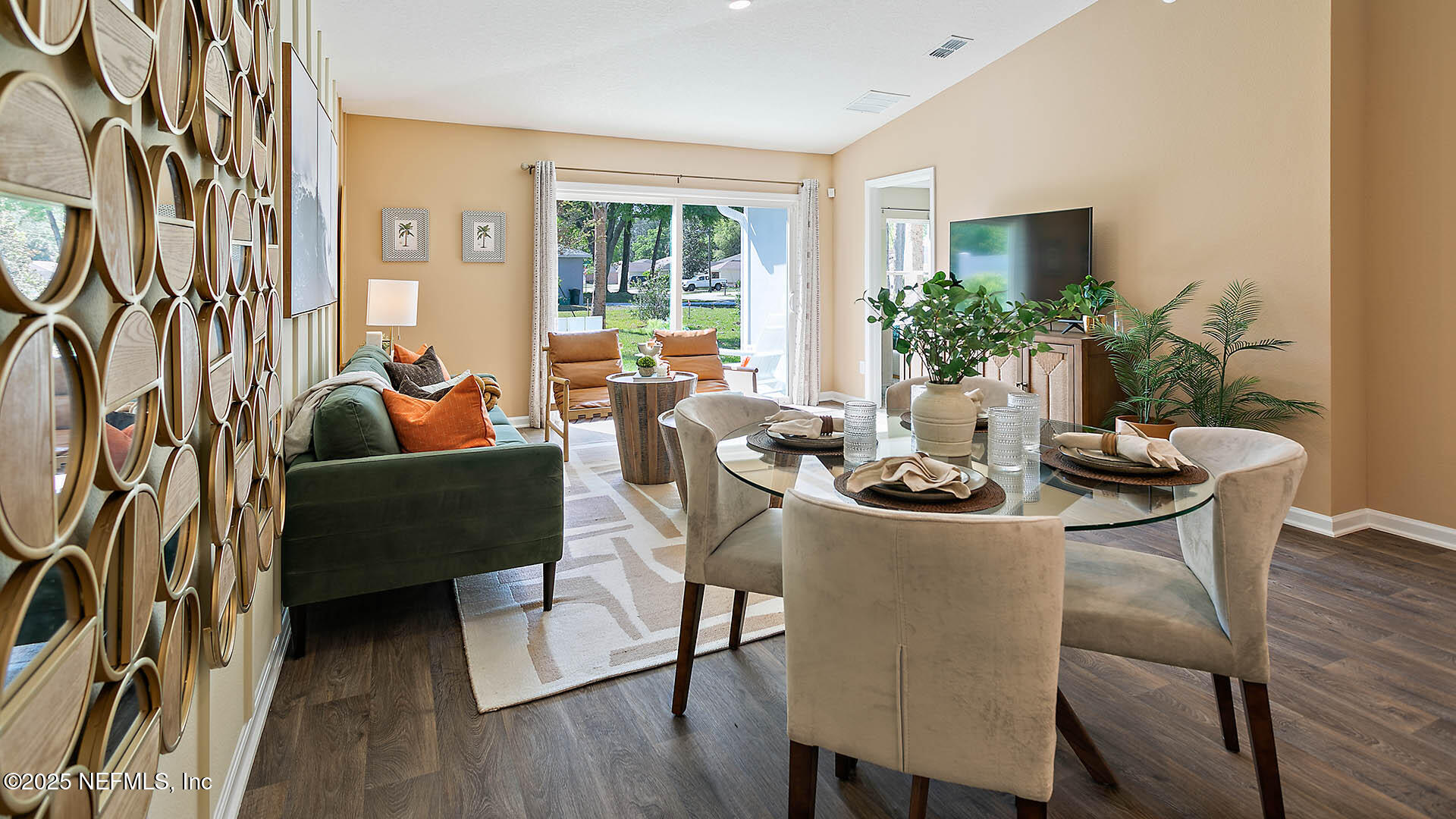 7 Ryall Lane, Unit B Palm Coast, FL 32164 - Photo 9 of 34 a dining room with furniture and wooden floor