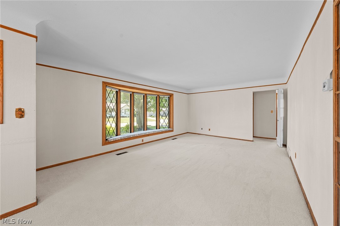 1759 Chelmsford Road Mayfield Heights, OH 44124 - Photo 5 of 39 Extra large bay window adds extra sun and the most charming seating.