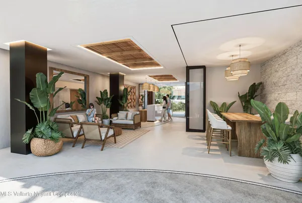a view of living room filled with furniture and flowers