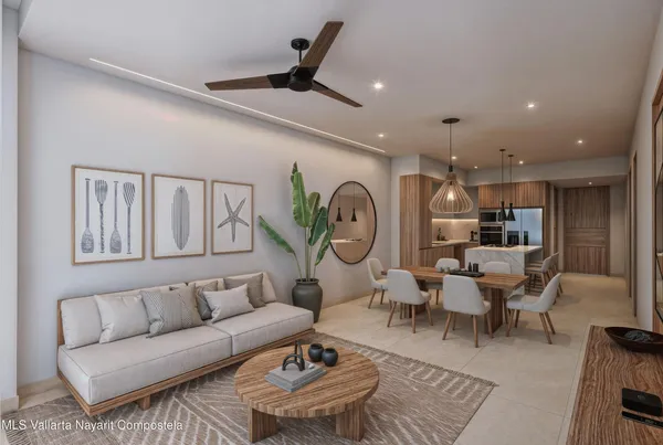 a living room with furniture and a clock