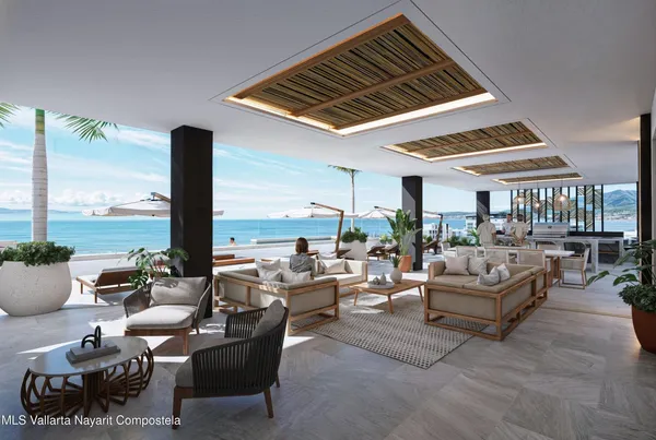 a living room with lots of furniture and a large window