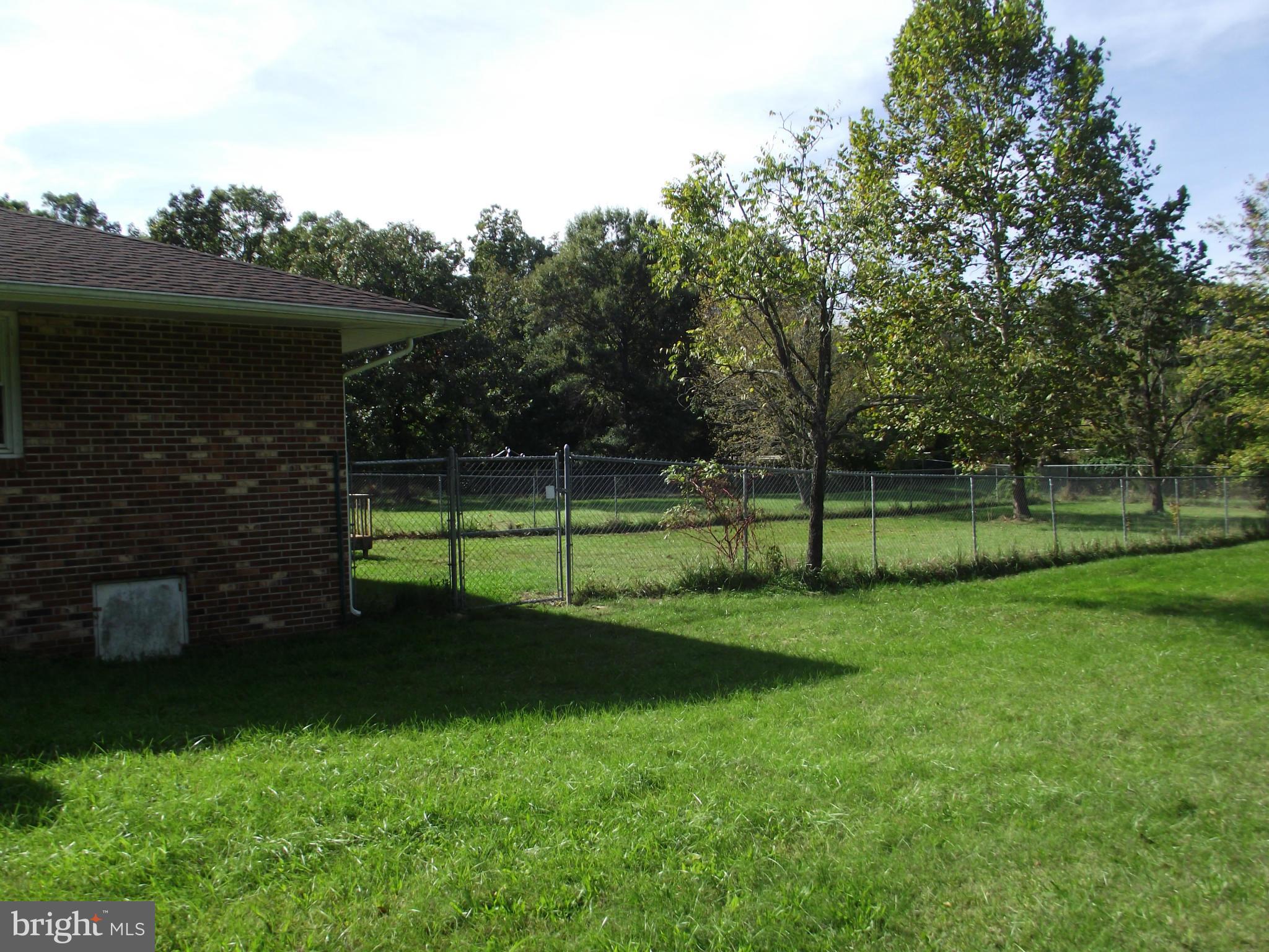30083 Rows Mill Road Rhoadesville, VA 22542 - Photo 24 of 30 Garage area fencing