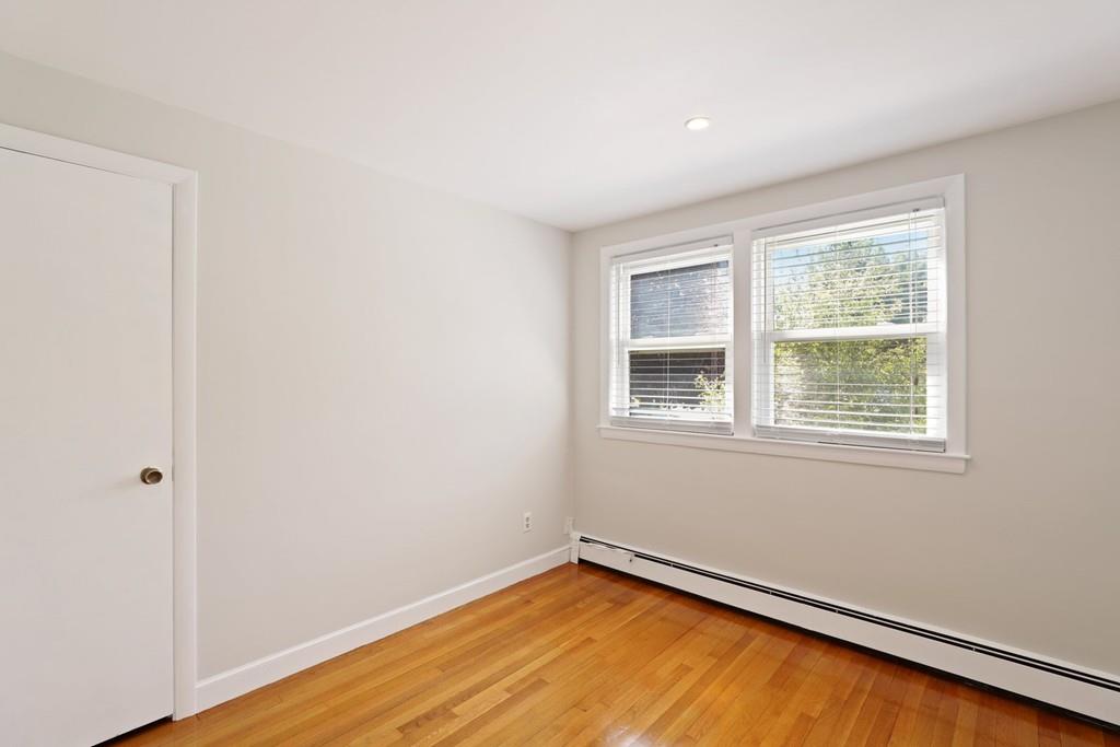 8 David Road Needham, MA 02494 - Photo 18 of 35 an empty room with a window