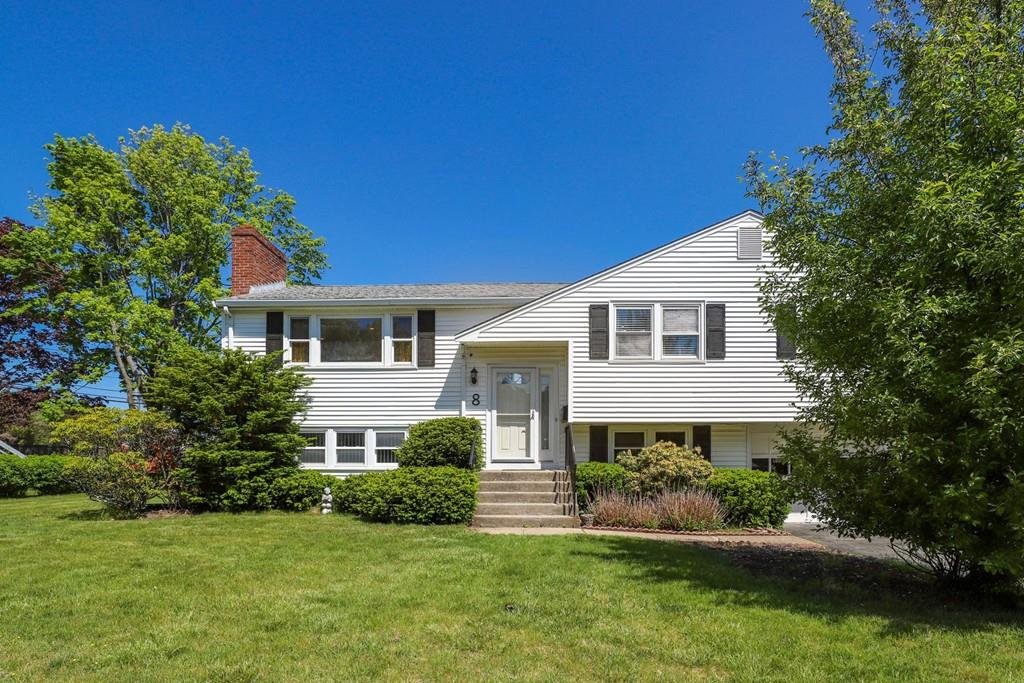 8 David Road Needham, MA 02494 - Photo 2 of 35 a front view of a house with a garden