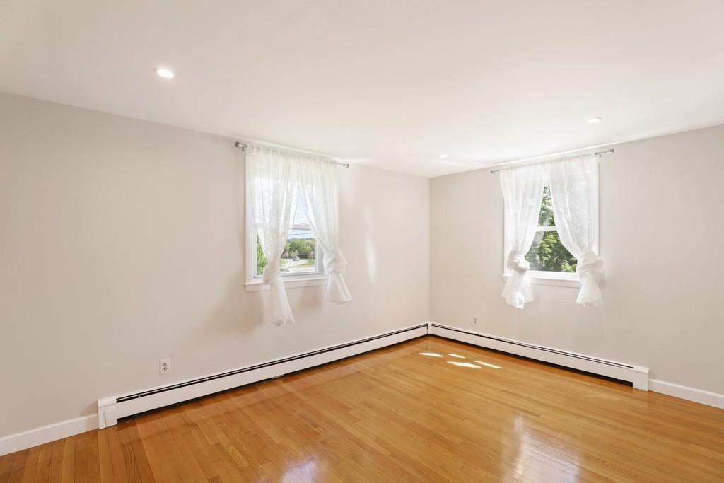 8 David Road Needham, MA 02494 - Photo 21 of 35 an empty room with a window