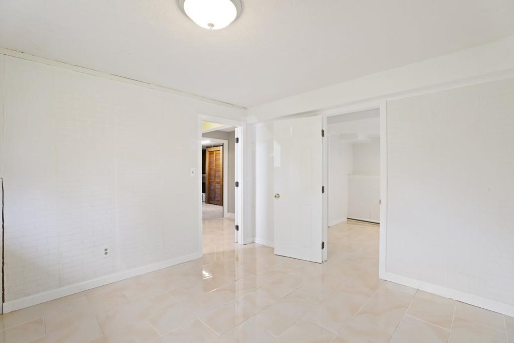 8 David Road Needham, MA 02494 - Photo 25 of 35 a view of an empty room