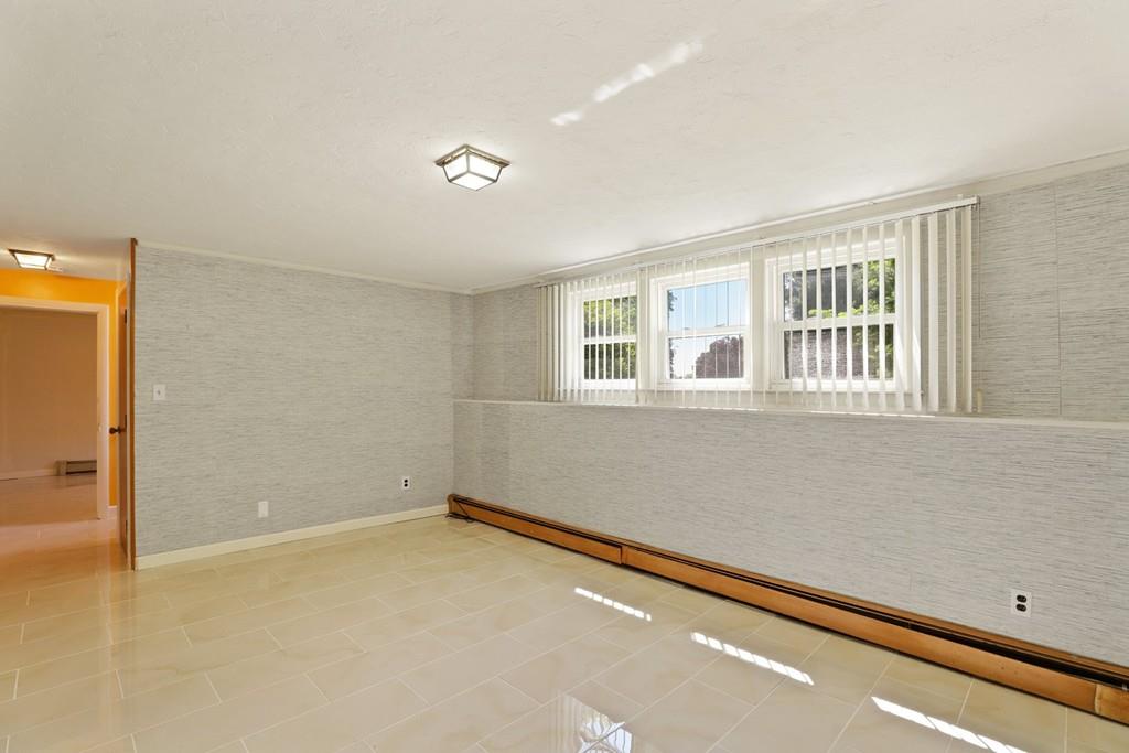 8 David Road Needham, MA 02494 - Photo 30 of 35 an empty room with a window