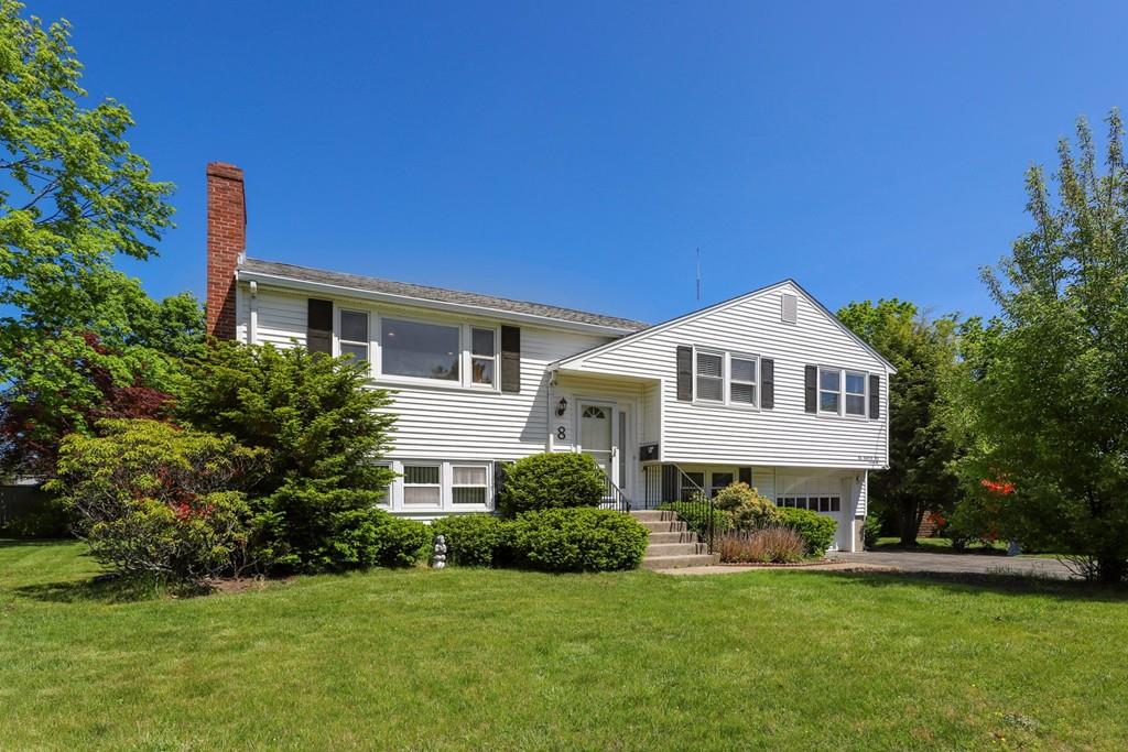 8 David Road Needham, MA 02494 - Photo 3 of 35 a front view of a house with a garden
