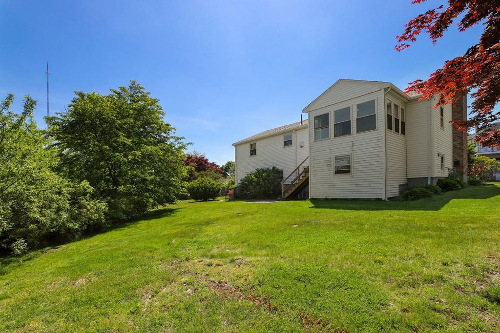8 David Road Needham, MA 02494 - Photo 33 of 35 a view of a house with backyard and garden