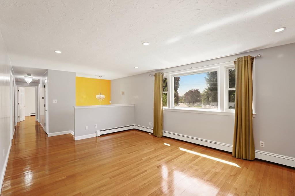 8 David Road Needham, MA 02494 - Photo 7 of 35 a view of empty room with wooden floor