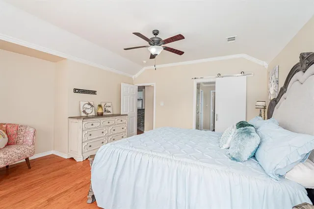 a bathroom with a granite countertop tub sink and mirror